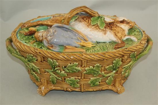 A Minton majolica game pie dish and cover, date code for 1861, 37cm